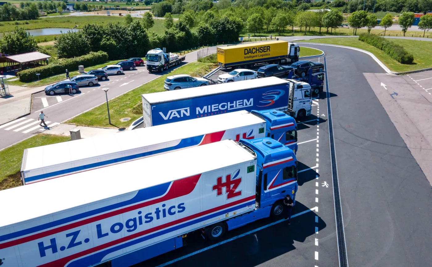 An aerial view of logistics trucks parked at a depot