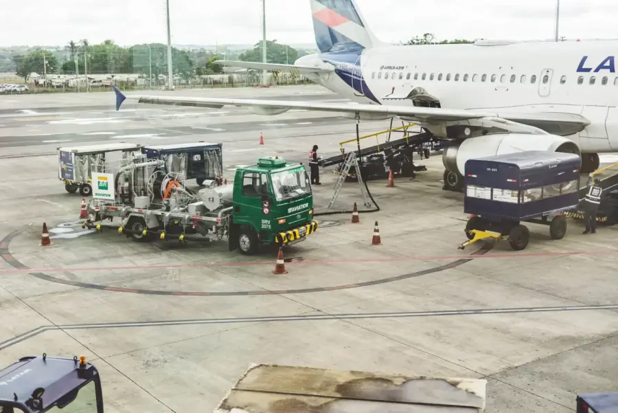 A cargo plane loading freight at an airport